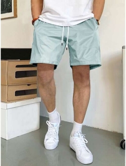 Men Slant Pockets Drawstring Waist Shorts