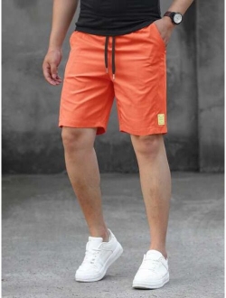 Men Letter Patched Drawstring Waist Shorts