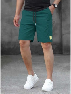 Men Letter Patched Drawstring Waist Shorts