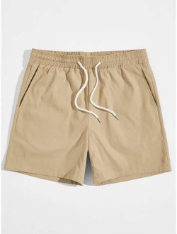 Men Slant Pocket Drawstring Waist Solid Shorts