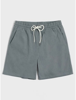 Men Slant Pocket Drawstring Waist Solid Shorts