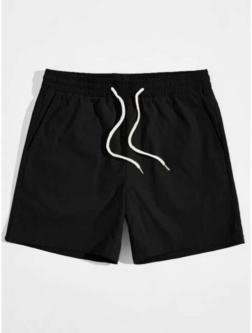 SHEIN Men Slant Pocket Drawstring Waist Solid Shorts