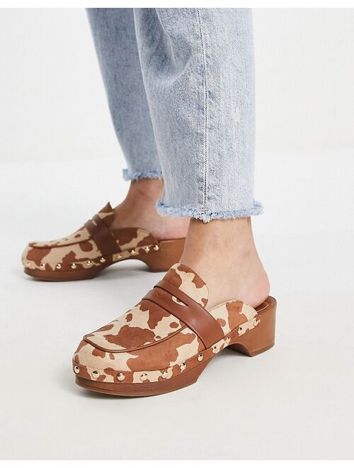 ASOS DESIGN Marleigh clog flat mules in tan cow print