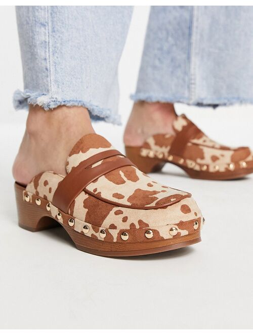 ASOS DESIGN Marleigh clog flat mules in tan cow print