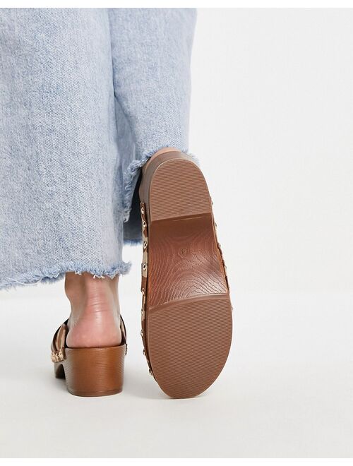 ASOS DESIGN Marleigh clog flat mules in tan cow print