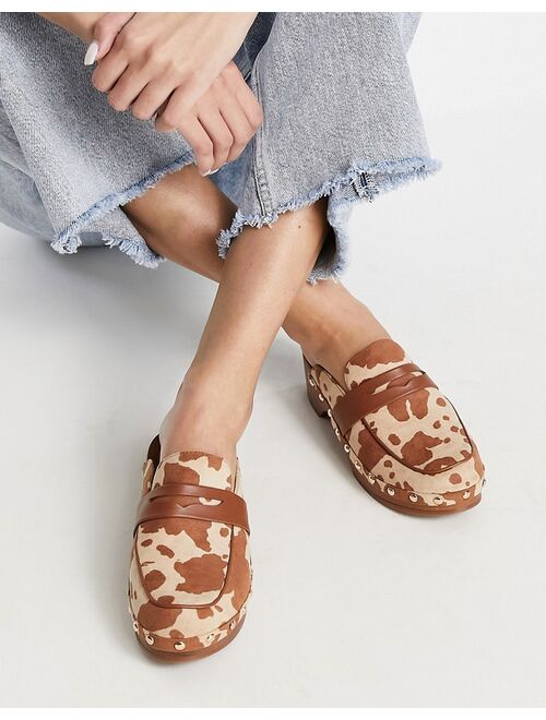 ASOS DESIGN Marleigh clog flat mules in tan cow print