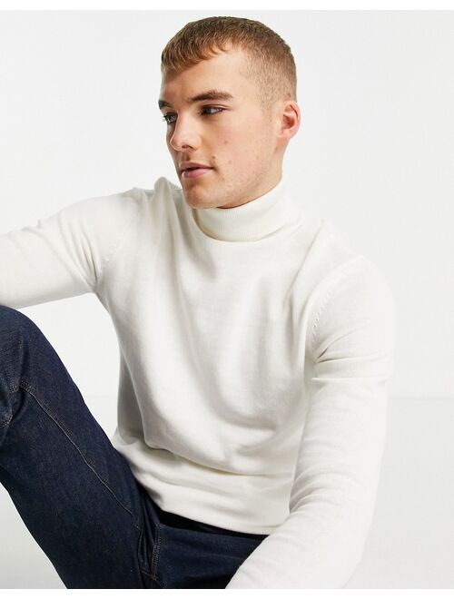 ASOS DESIGN knitted cotton roll neck sweater in white