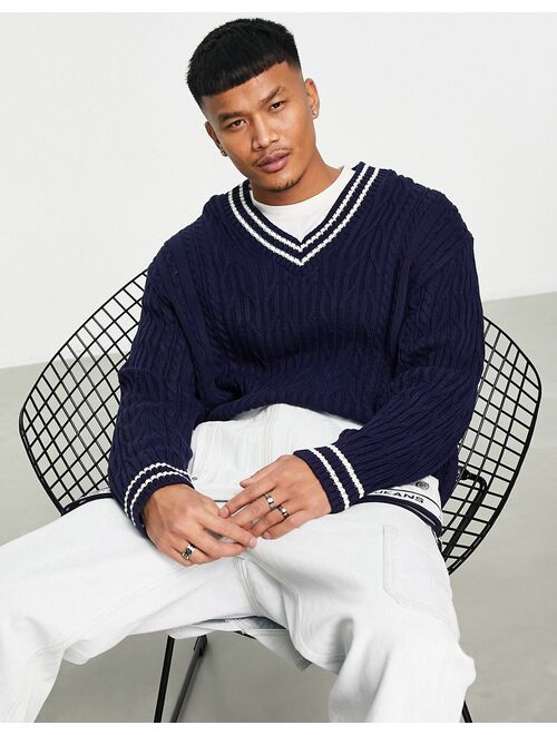 ASOS DESIGN cable knit cricket sweater in navy