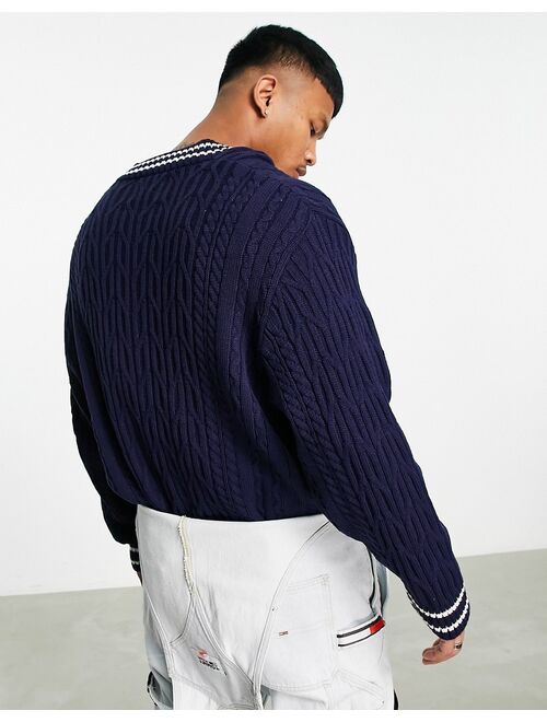 ASOS DESIGN cable knit cricket sweater in navy