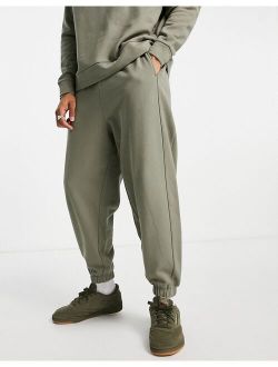 oversized sweatpants with ribbed panels in green - part of a set