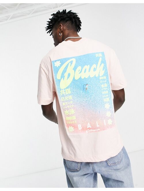 COLLUSION Unisex T-shirt with beach print in light pink