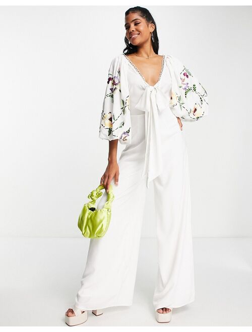 ASOS DESIGN occasion big sleeve tie front wide leg jumpsuit with embroidery