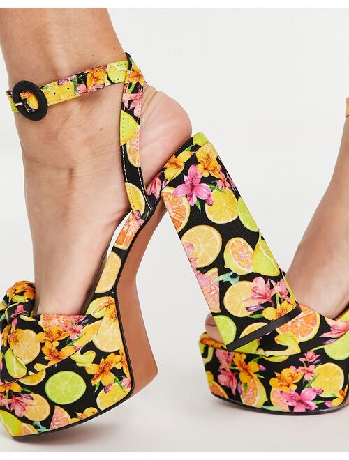 ASOS DESIGN Note knotted platform heeled sandals in fruit print