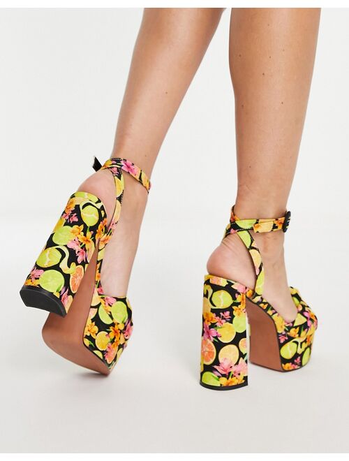 ASOS DESIGN Note knotted platform heeled sandals in fruit print