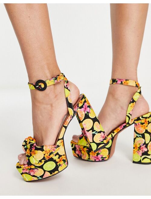 ASOS DESIGN Note knotted platform heeled sandals in fruit print