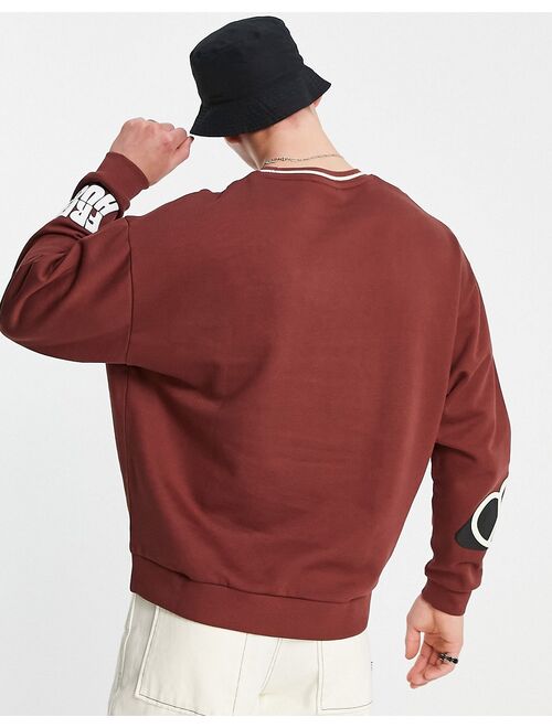 ASOS DESIGN oversized sweatshirt in brown with text prints