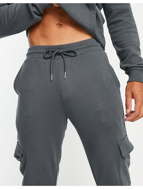 ASOS DESIGN tracksuit with hoodie & skinny cargo sweatpants in washed black