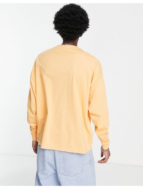 ASOS DESIGN long sleeve oversized T-shirt in apricot