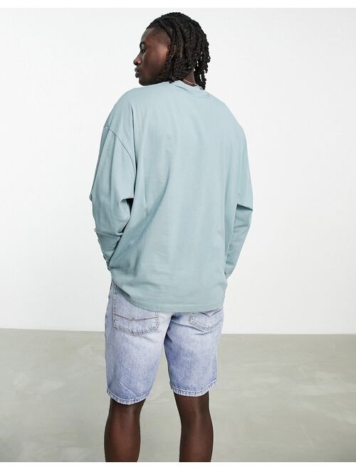 ASOS DESIGN oversized long sleeve t-shirt in washed blue