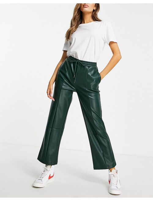 ASOS DESIGN faux leather pants in dark green