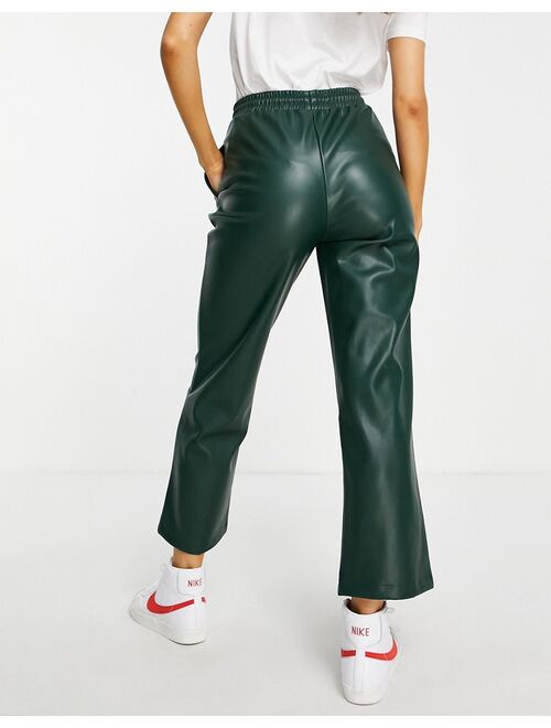 ASOS DESIGN faux leather pants in dark green