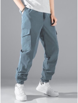 Men Flap Pocket Side Drawstring Waist Pants