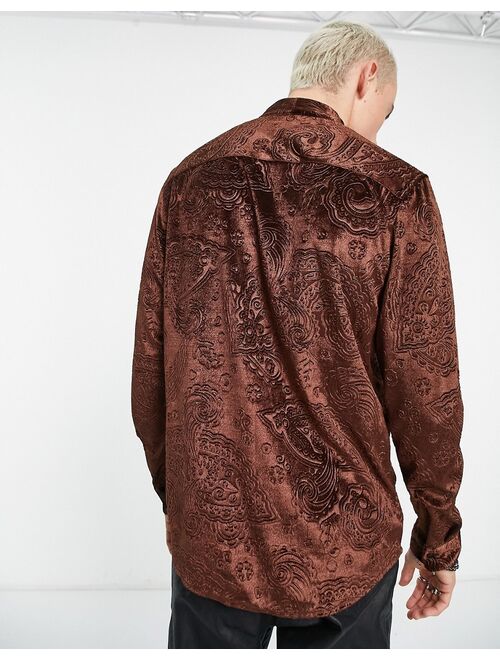 ASOS DESIGN paisley embossed velvet shirt with tie neck in brown