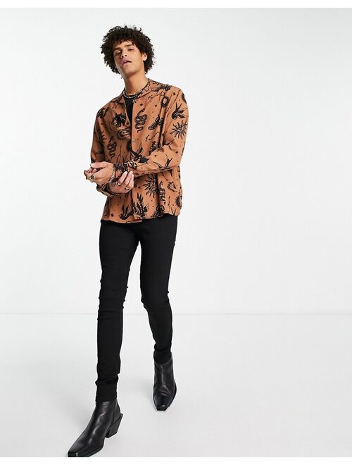 ASOS DESIGN relaxed revere shirt in brown with celestial print