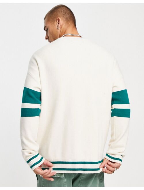 Bershka collegiate Brooklyn knit crew neck sweater in ecru