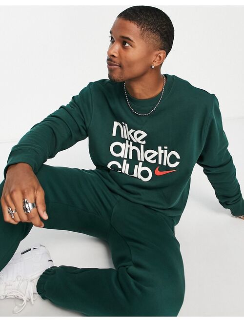 Nike Athletic Club retro logo crew neck sweatshirt in dark green