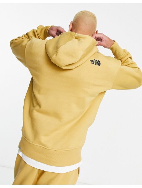 The North Face Essential hoodie in tan Exclusive at ASOS