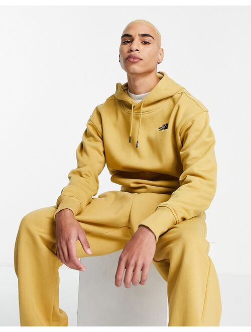 The North Face Essential hoodie in tan Exclusive at ASOS