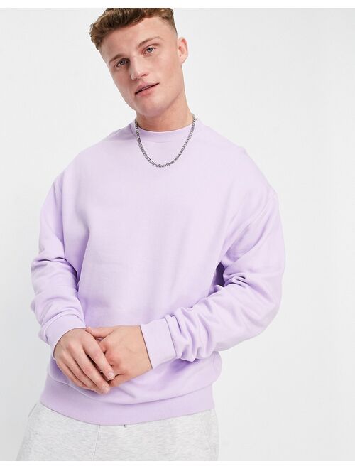 ASOS DESIGN oversized sweatshirt in purple