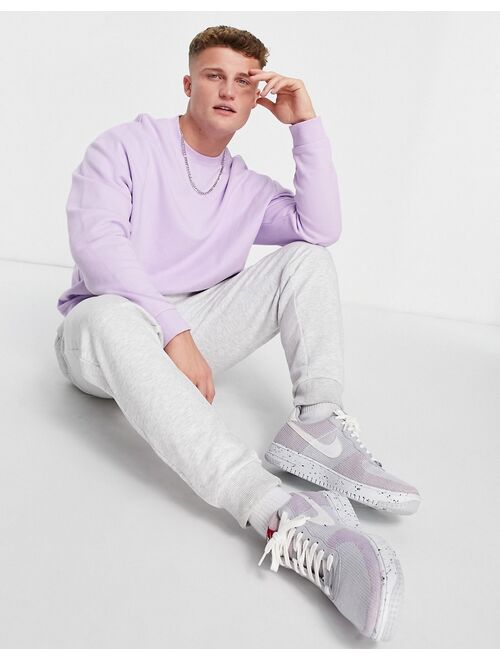 ASOS DESIGN oversized sweatshirt in purple