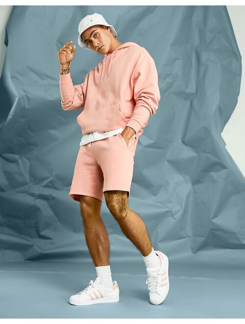 ASOS DESIGN oversized hoodie in pastel orange