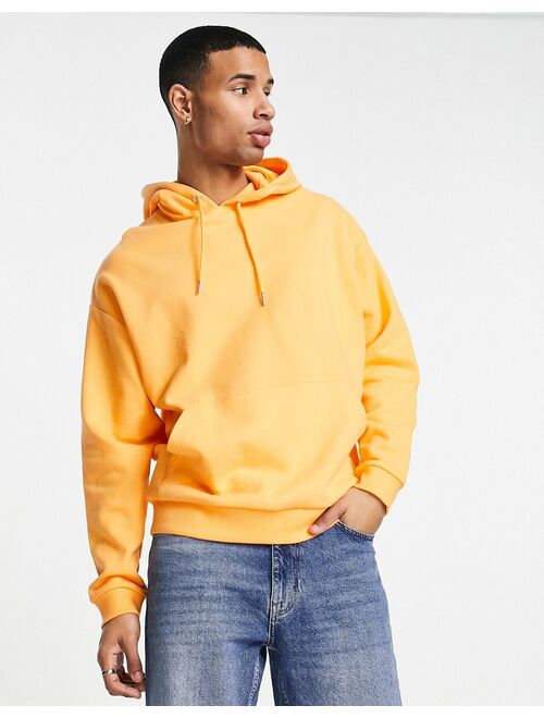 ASOS DESIGN oversized hoodie in pastel orange