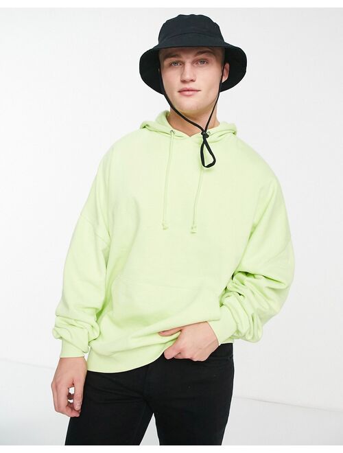 ASOS DESIGN super oversized hoodie in washed lime green