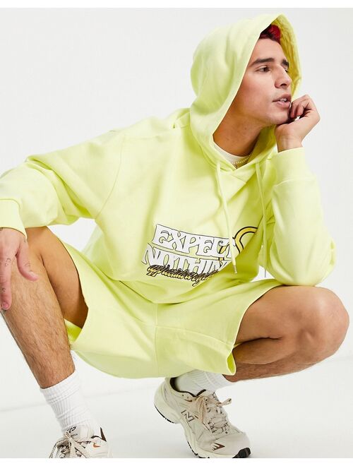 ASOS DESIGN oversized hoodie in yellow with text print - part of a set