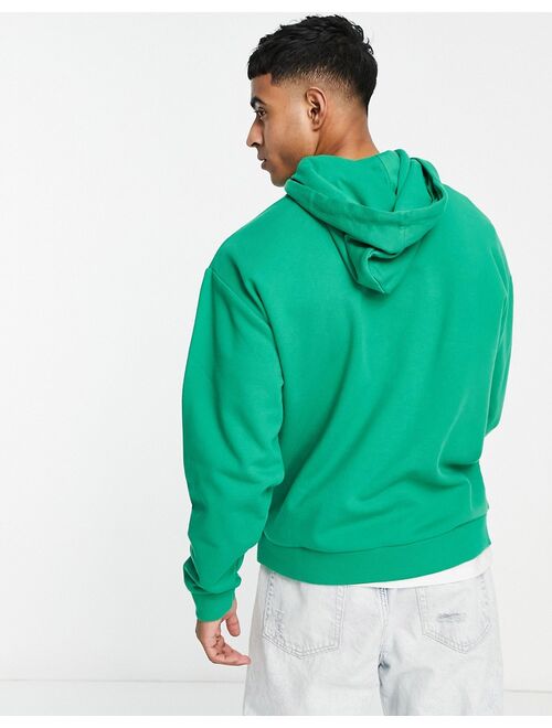 ASOS DESIGN oversized hoodie in green