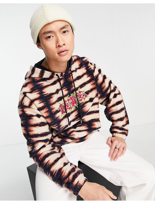 ASOS DESIGN oversized hoodie in all over print fleece with front text embroidery