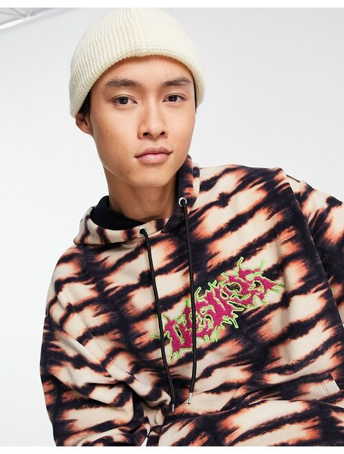 ASOS DESIGN oversized hoodie in all over print fleece with front text embroidery