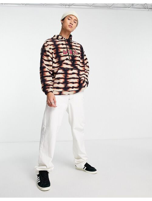 ASOS DESIGN oversized hoodie in all over print fleece with front text embroidery