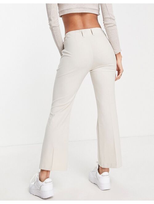 Pull&Bear mid rise flare pants with pocket detail in beige