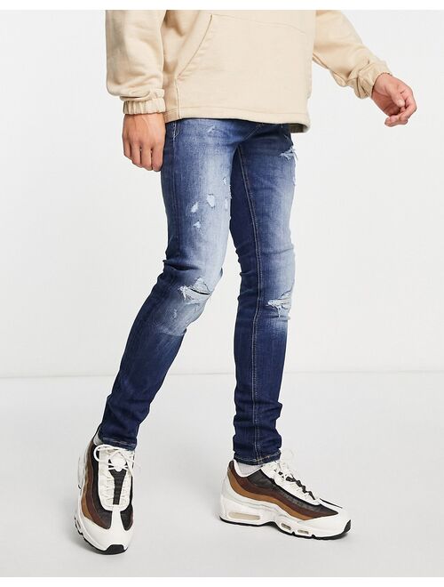 Jack & Jones Intelligence Liam skinny fit jean with rips in mid blue wash