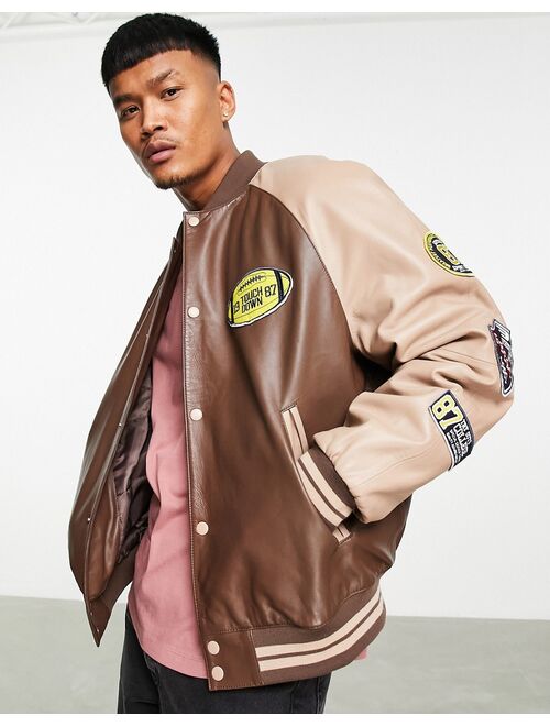 ASOS DESIGN oversized real leather varsity jacket in brown