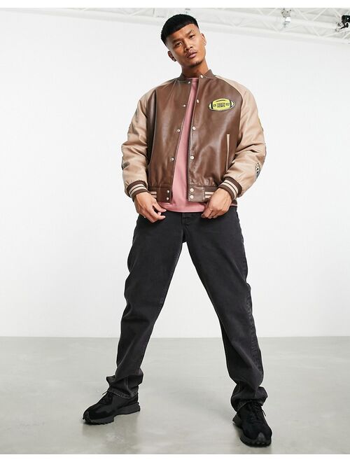 ASOS DESIGN oversized real leather varsity jacket in brown