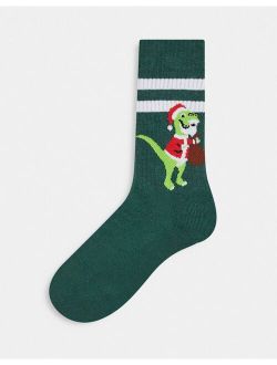 sports socks in green with Christmas dinosaur and stripe