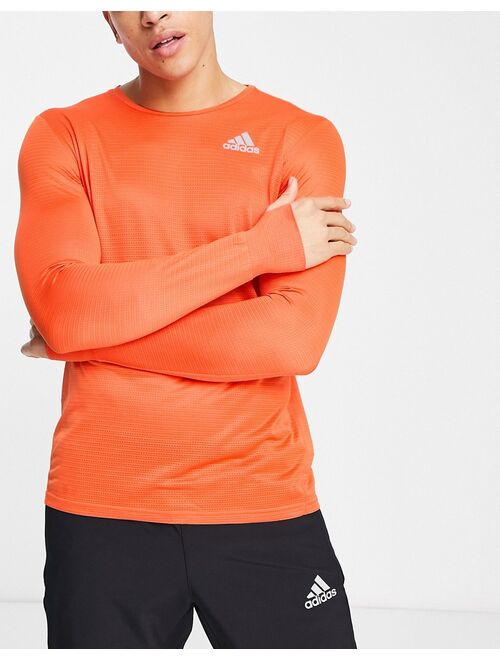 adidas performance adidas Running Own The Run long sleeve t-shirt in orange