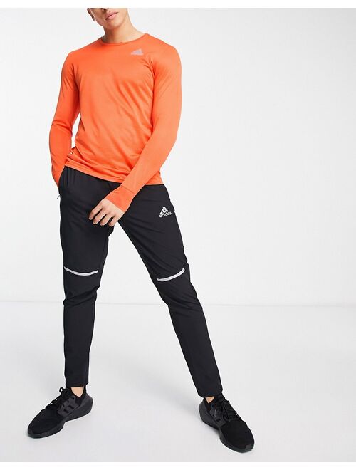 adidas performance adidas Running Own The Run long sleeve t-shirt in orange