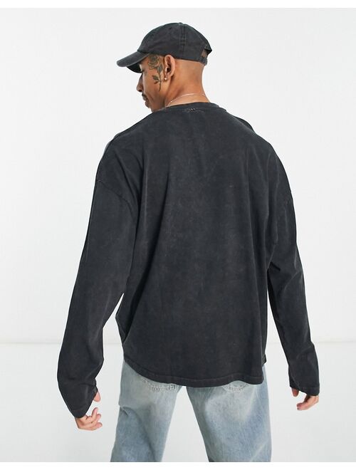 ASOS DESIGN oversized heavyweight long sleeve T-shirt in washed black